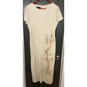 Donna Morgan women’s dress. Midi, beaded, linen and rayon. Cream .
Size 10.